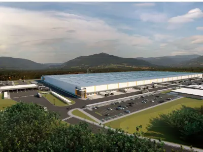 Imagem 3D em perspectiva com portaria e bloco K100.